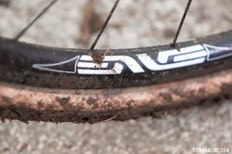 Longtime sponsor, Enve provides carbon (of course) tubular wheelset with classic 25 rims (internal nipples) laced X2 with 28 black spokes to Shimano centerlock hubs © Cyclocross Magazine