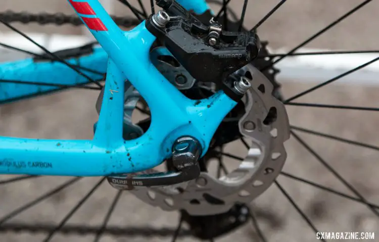 External rear brake line runs along the top tube and down the left seatstay to the seatstay-mounted caliper. The seatstay mounting is reinforced by a truss between it and chainstay to resist the hub-centric brake force. © Cyclocross Magazine