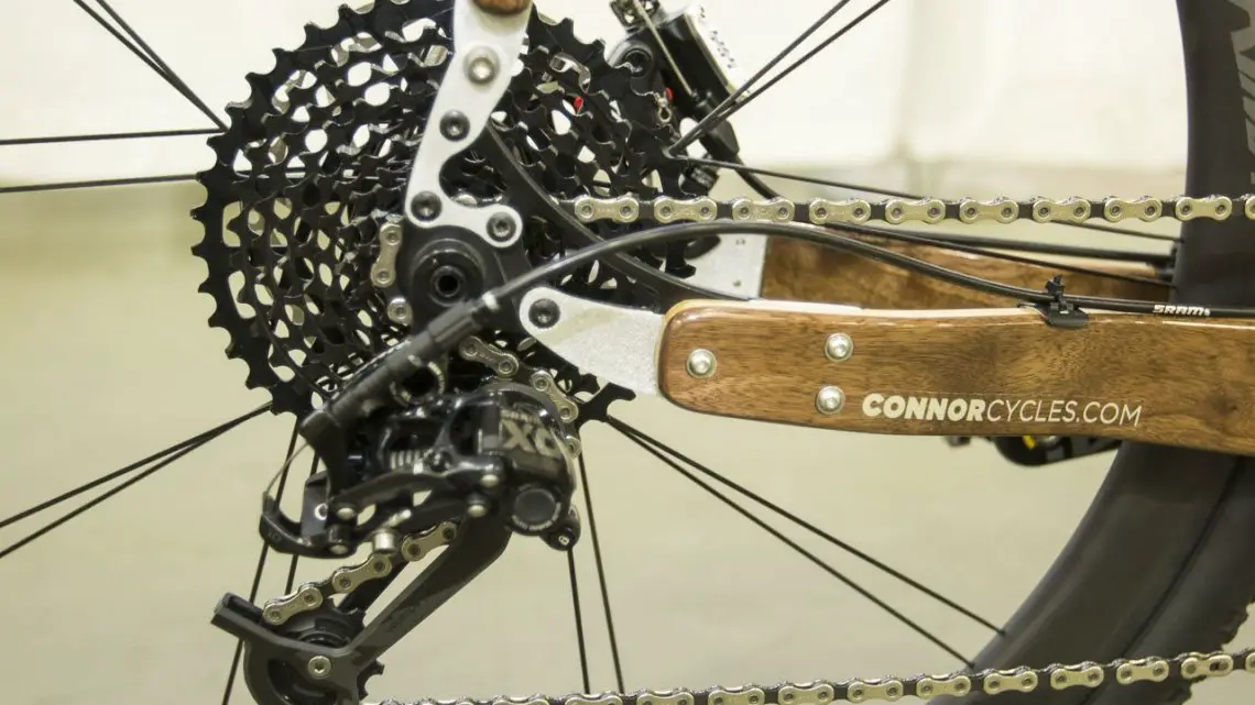 Chris Connor from Connor Wood Bicycles did some playing with SRAM components for this customer's bike, and manged to pair an X0 rear derailleur with an XD 10-42 11-speed cassette and Force 11-speed road shifter. NAHBS 2015. © Cyclocross Magazine