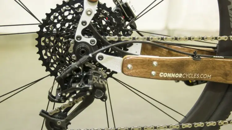 Chris Connor from Connor Wood Bicycles did some playing with SRAM components for this customer's bike, and manged to pair an X0 rear derailleur with an XD 10-42 11-speed cassette and Force 11-speed road shifter. NAHBS 2015. © Cyclocross Magazine