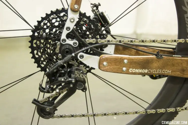 Chris Connor from Connor Wood Bicycles did some playing with SRAM components for this customer's bike, and manged to pair an X0 rear derailleur with an XD 10-42 11-speed cassette and Force 11-speed road shifter. NAHBS 2015. © Cyclocross Magazine