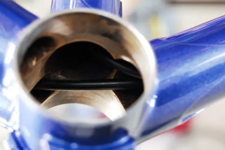 The housing for the rear brake and dropper post run internally through the frame. © Ron Sutphin