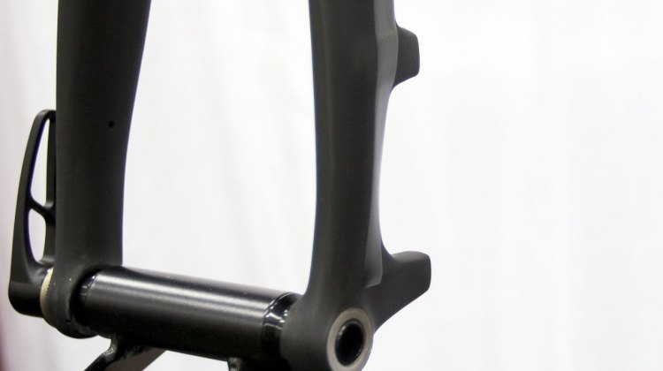 TRP's carbon disc brake thru-axle cyclocross fork initially will support 15mm thru axles, and later 12mm and fender mounts. As seen at NAHBS 2015 in Louisville. © Cyclocross Magazine
