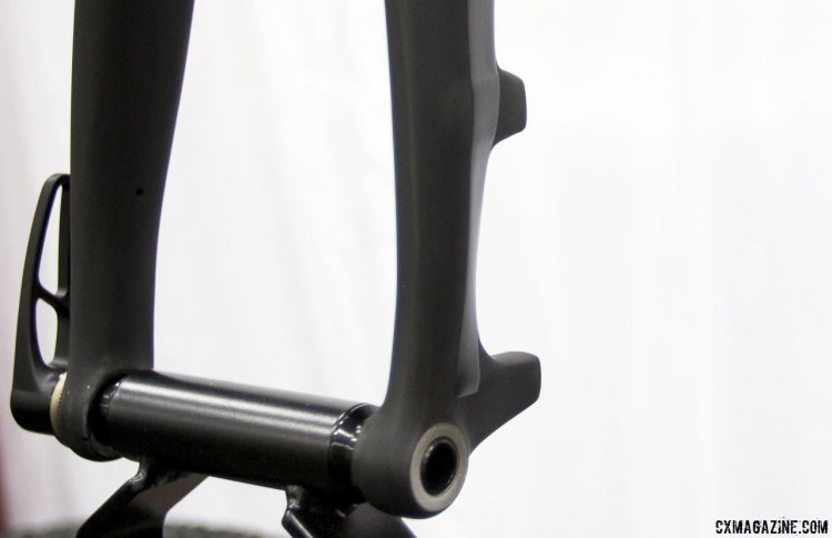 TRP's carbon disc brake thru-axle cyclocross fork initially will support 15mm thru axles, and later 12mm and fender mounts. As seen at NAHBS 2015 in Louisville. © Cyclocross Magazine