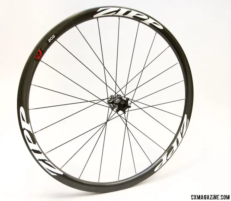 The new Zipp 202 Firecrest Disc wheels keep the same 32mm deep and 16.25mm wide (internal) rim, but move to Zipp's new 77/177 hubs that accept thru axles and XD drivers. Hubs are lighter, but nipples are now brass so weight stays the same. © Cyclocross Magazine
