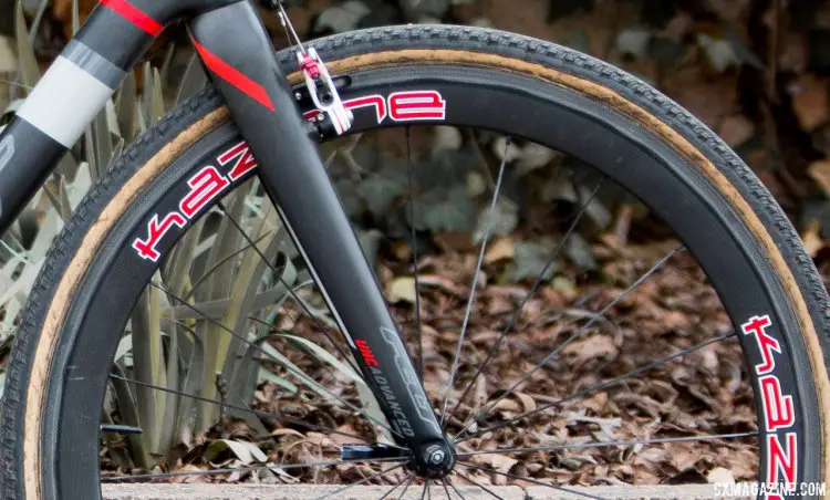 Curley’s front tire was a custom paired 32mm Dugast casing and non-Dugast tread on the front, while the rear was a standard Typhoon. © Cyclocross Magazine