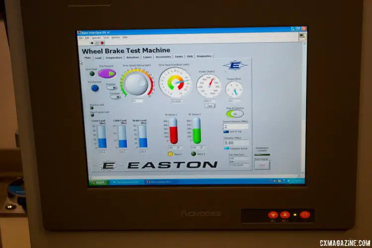 Easton braking and heat resistance test of carbon rims. The red and green sensors measure the rim's temperature. The test runs for an equivalent of two miles, braking while applying 600 watts, or until failure. © Cyclocross Magazine