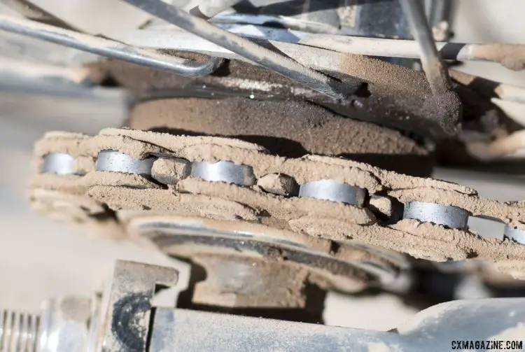 Braking on the long downhills caused grease to leak out from the hub, creating a magnet for the dust of the dirt roads. Many chains looked like this after 60 or 100 miles. © Cyclocross Magazine