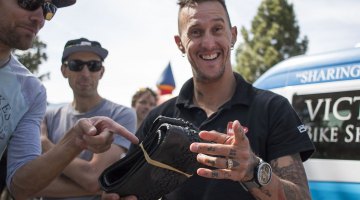 Ben Berden rode prototype 35c Kenda gravel tires to second place, but also lucked out to catch a 40c gravel tire door prize thrown out to the crowd. 2015 Lost and Found gravel race. © Cyclocross Magazine