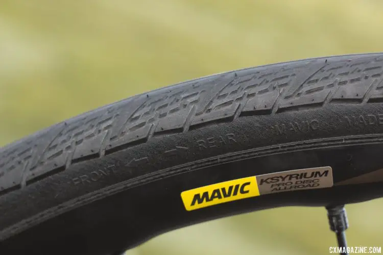 Mavic's new Ksyrium road line's Yksion 30c gravel tire is directional and tubeless ready 120 tpi clincher, with a Kevlar bead, but requires sealant for tubeless use. There's a bead-to-bead belt for puncture resistance. © Cyclocross Magazine