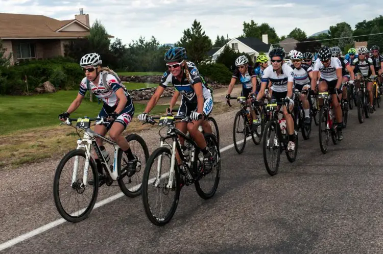 Mindy McCutcheon (Canyon Bicycles) and Joey Lythgoe (Kühl) lead the women’s race through the flat roads after the start. Angie Kell (Church of the Big Ring) and Rhae Shaw (Liv) sit tucked in behind them. This is some of the last flat riding they will see at the Crusher.