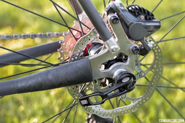Calfee doesn't just do carbon. It relies on titanium dropouts, and aluminum bottom bracket and head tube shells for durability. Calfee Manta CX soft tail. © Cyclocross Magazine