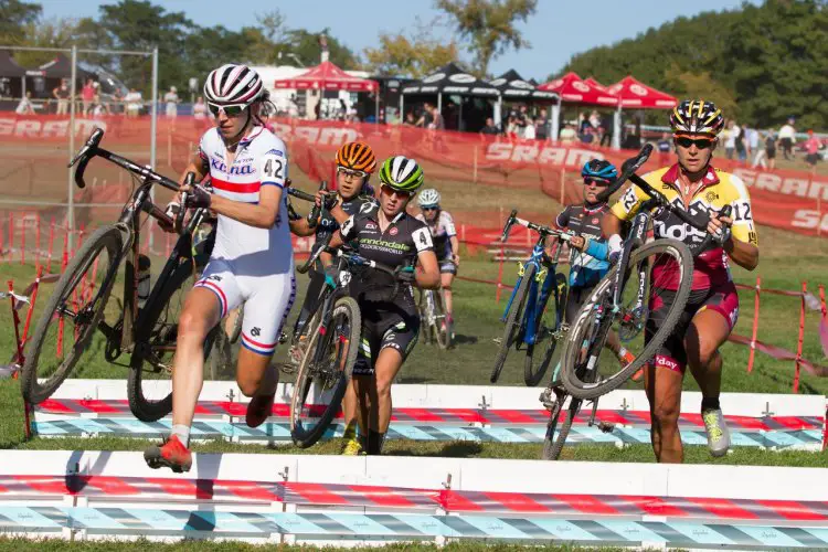 Helen Wyman, British National Cyclo-cross Champion, leading top racers through the barriers on her way to a win last year. Photo: Todd Prekaski