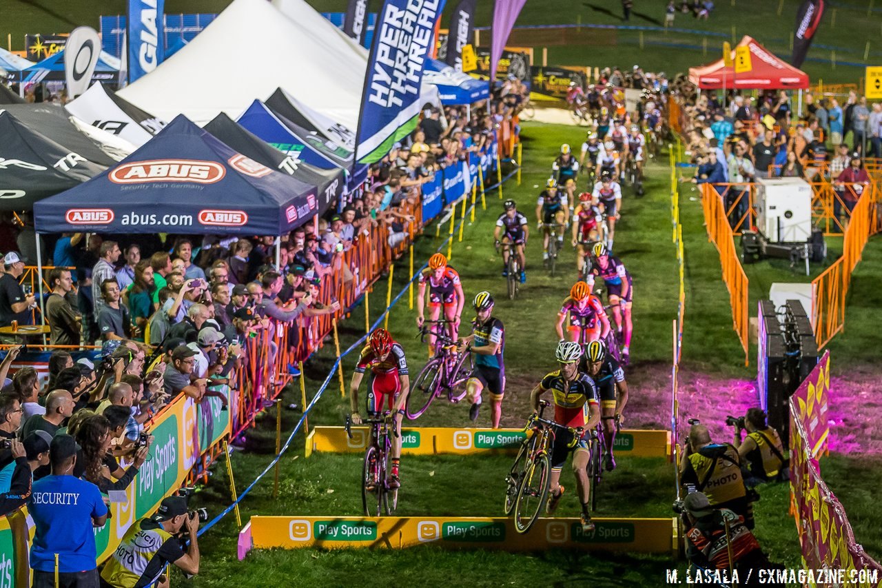 The front of the Elite Men’s Race was still well together by the time they hit the barriers. © Matthew Lasala / Cyclocross Magazine