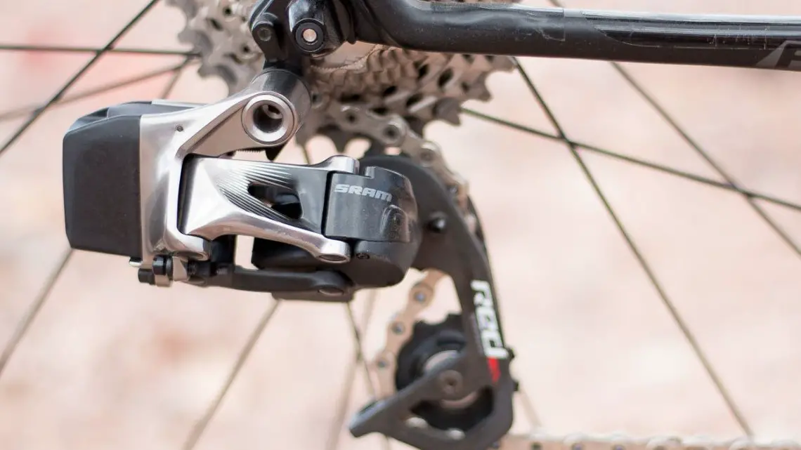 The SRAM RED eTAP electronic / wireless drivetrain shares the same type of battery with the front derailleur, and controls all the pairing. Short cage only, max 28t for now. © Cyclocross Magazine