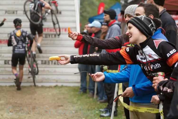 Hand-ups may not be a crime when it's hot, but this isn't what the UCI has in mind. photo: Twinkies, Twizzlers (both black and red), and Cheetos were some of the favorite hand-ups offered to a Cat 4/5 field. Photo by SnowyMountain Photography