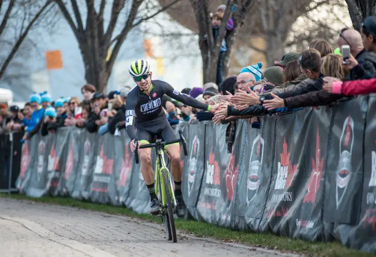 Jeremy Durrin celebrates his 2015 Manitoba Grand Prix of Cyclocross win with Winnipeg fans. © Thomas Fricke