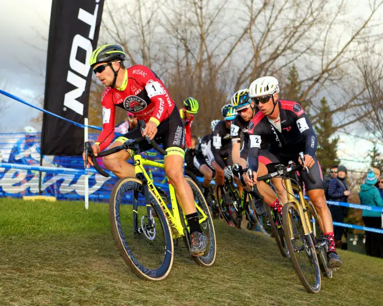 Michael Van Den Ham (1) and Mike Garrigan (2) lead the group thru the "Knoll of Pain" on the first lap. © Randy Lewis/lewisimages