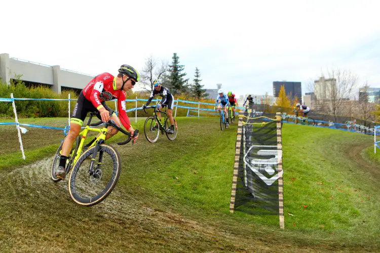 Van Den Ham leads the group into one of the many off camber & slick corners. © Randy Lewis/lewisimages