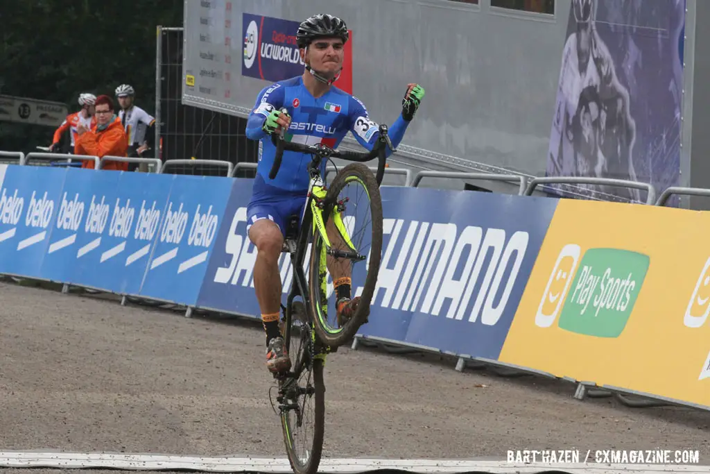 Gioele Bertolini wins both the U23 race at the Valkenbug World Cup, and the award for the coolest finish line salute © Bart Hazen