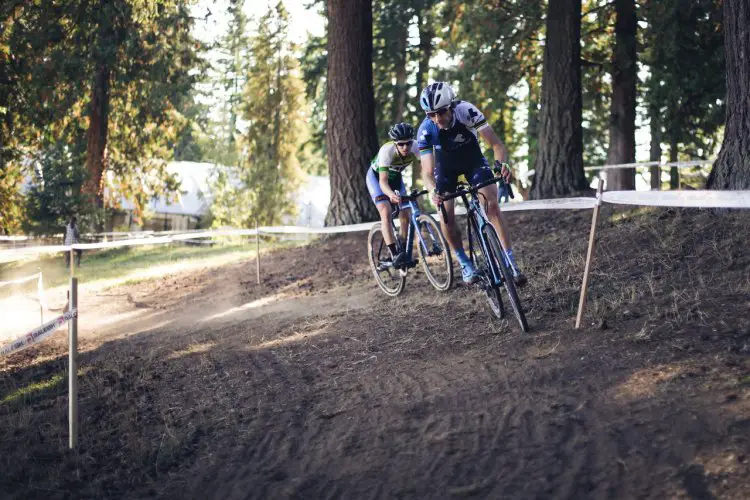 Russell Stevenson leads Fisher through one of the course's technical descent. Photo by Derek Blagg