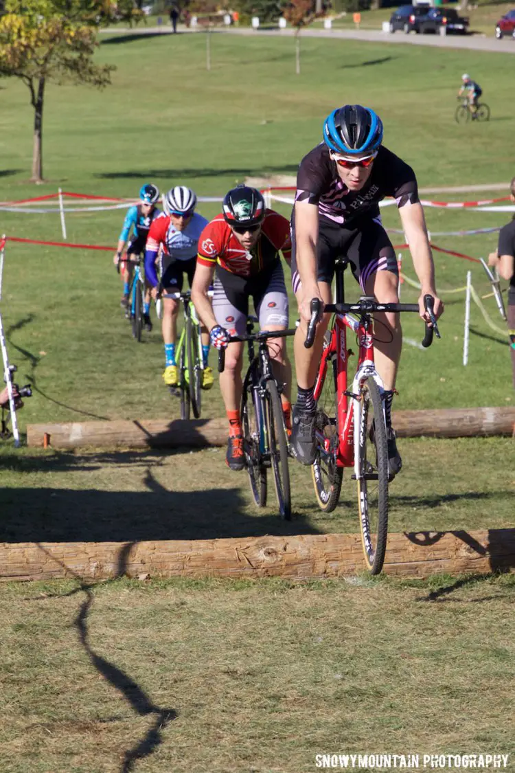 David Lombardo (Crystal Lake, IL) leads Brandon Feehery (Homewood, IL), David Reyes (Chicago, IL), and Caleb Swartz (Madison, WI) over the telephone poles. ©SnowyMountain Photography