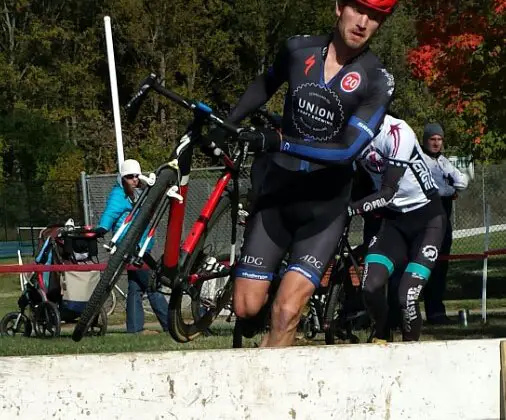 Greg Wittwer (C3/Twenty-20 Cycling Co) leads Nick Waite (Pro Tested Gear) into the barriers.