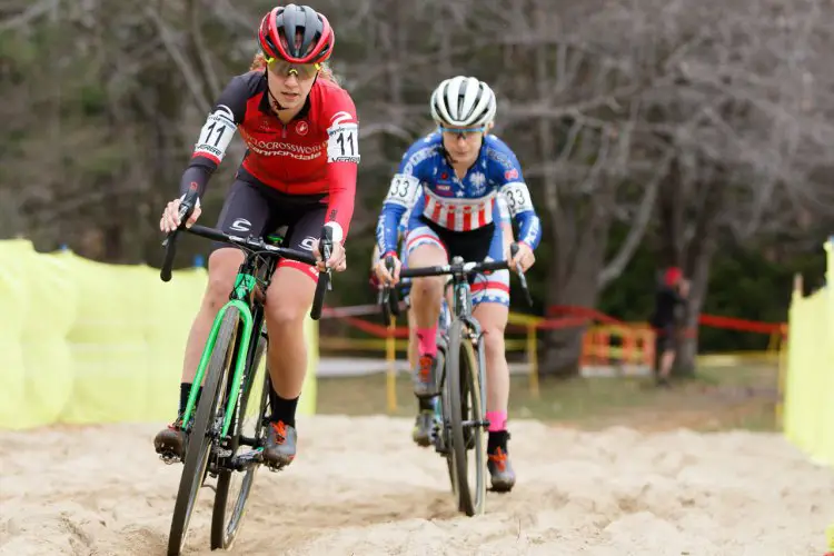 Emma White leads Ellen Noble through the sandpit. Photo by Todd Prekaski