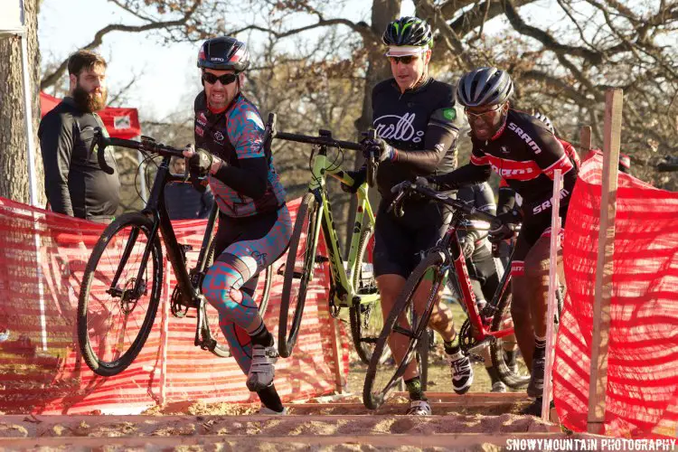 Ryan Folly (Dubuque, IA), Terry Ogrady (Chicago, IL), and Mulubwa Munkanta (Chicago, IL) fight their way up the Belgian stairs. © Snowymountain Photography