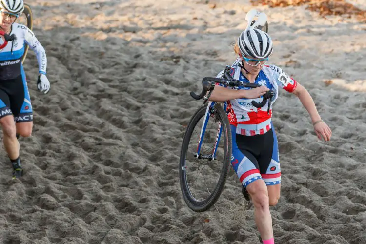 Noble runs through the beach section, chased by teammate Greaser. © Todd Prekaski