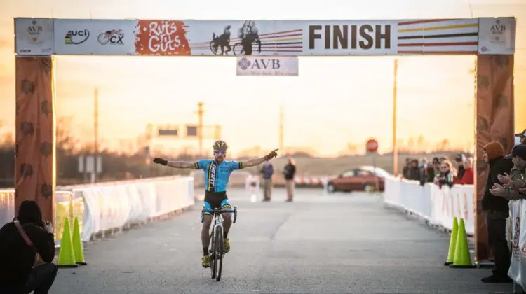 Tristan Uhl posts up in an Oklahoma sunset to celebrate his day one win at Ruts 'n Guts. © Andy Chasteen