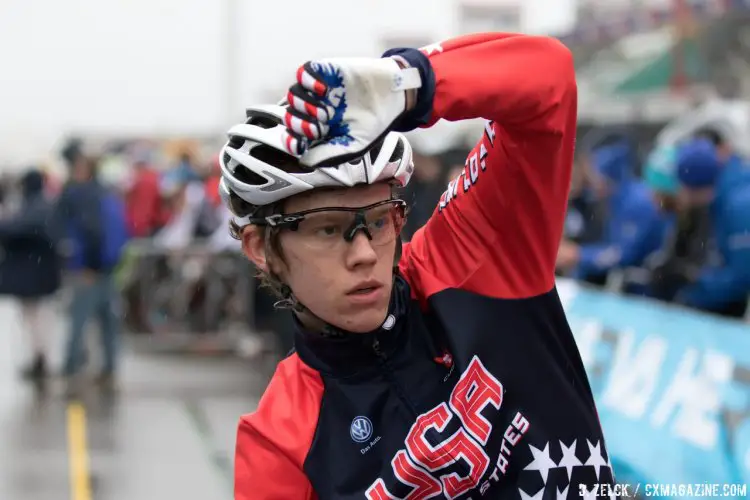 Spencer Petrov performs one last stretch before the warm-ups come off. © Danny Zelck / Cyclocross Magazine