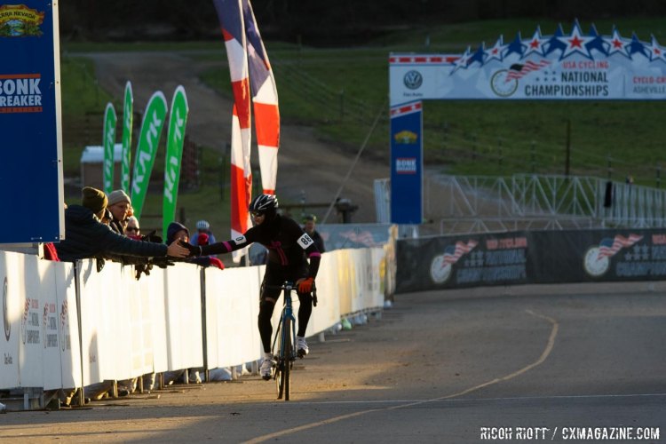 Whitney Fanning high-fives fans as he becomes a National Champion. © R. Riott / Cyclocross Magazine