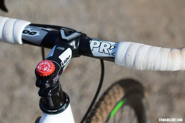 Tim Allen's PRO Vibe bar and stem combo with a little more personal flair in the form of a New Belgium bottle cap atop his headset cap. 2016 Cyclocross National Championships. © R. Riott/Cyclocross Magazine