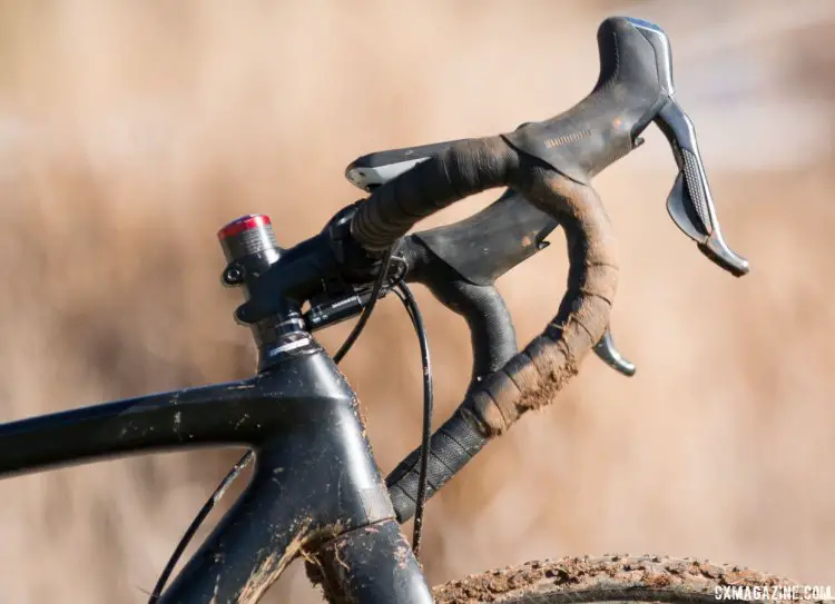 Fleischer still has room to play with on the steer tube to adjust the fit. Hoods are positioned high, and the bars are rotated up. 2016 Cyclocross Nationals. © Cyclocross Magazine