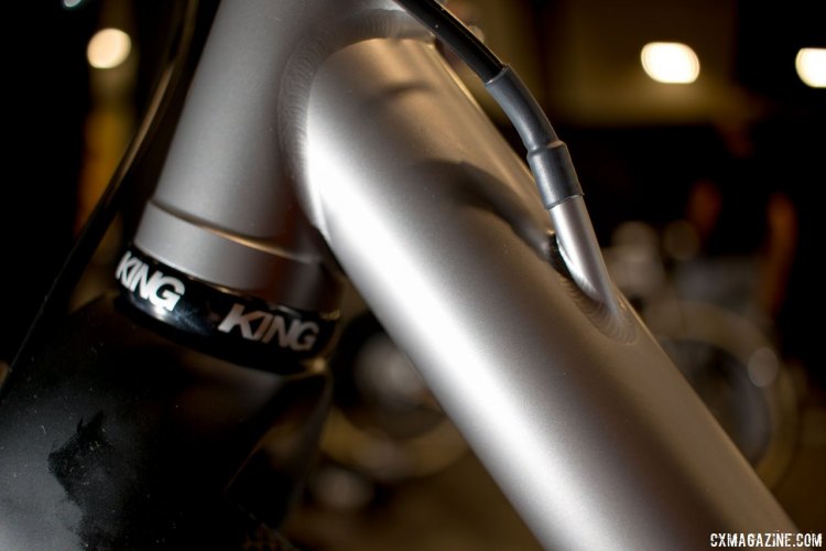 Eriksen's gravel bike, with internal routing and an elaborate fitting for the housing. NAHBS 2016. © Cyclocross Magazine