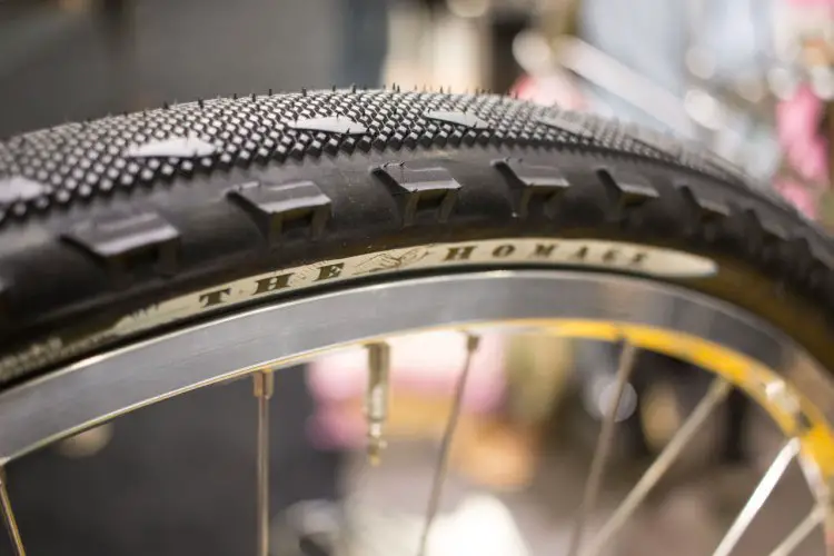 Simworks' The Homage tire will come in a green tread with skin sidewall, homage to the Michelin Wildgripper and Mud tires. Black treads with black or brown sidewalls are also an option. New gravel and cyclocross tires, NAHBS 2016. © Cyclocross Magazine