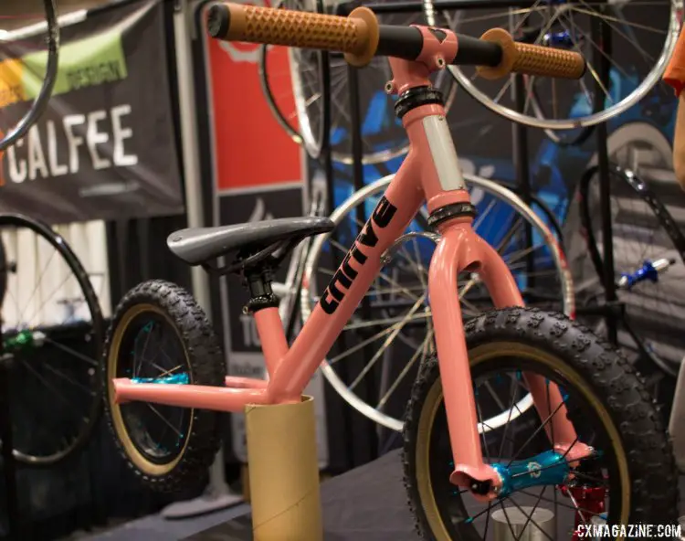 The oner of Thrive built a balance bike for bloger BicycleCrumb's 4-month old daughter. She has plenty of time to grow into this decked-out balance bike, complete with carbon bar and carbon-railed saddle. NAHBS 2016. © Cyclocross Magazine