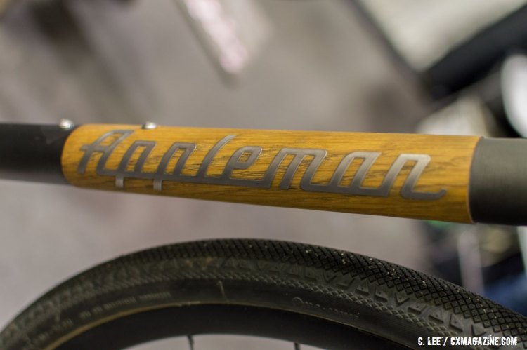 A water-jet cut titanium logo on a wood panel is an example of Appleman's unique style. NAHBS 2016. © Clifford Lee / Cyclocross Magazine