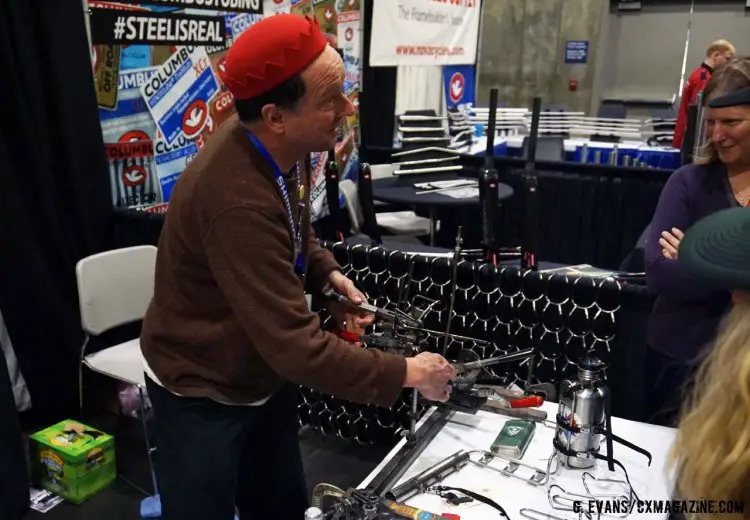 King Cage founder Ron Andrews shows a curious audience how he transforms a steel rod into the framework for one of the most highly regarded bottle cages in the industry. © Cyclocross Magazine