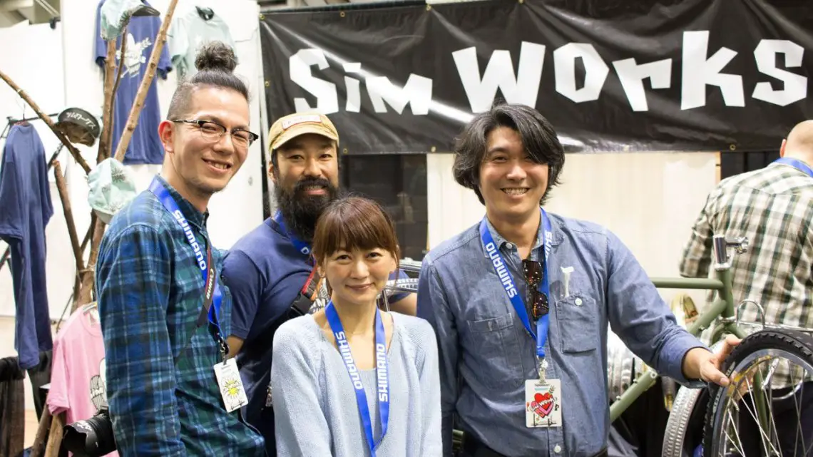 Shinya Tanaka (right) has built a little empire with his Sim Works and Circles brands in Japan, and now the company imports into the States. Tanaka has twenty employees, and brought twelve of them to the States for this trip. His businesses include a bike shop, a paint shop, component brand, an importer (including bringing Cyclocross Magazine into Japan), and a restaurant. Now he's also an exporter. © Cyclocross Magazine