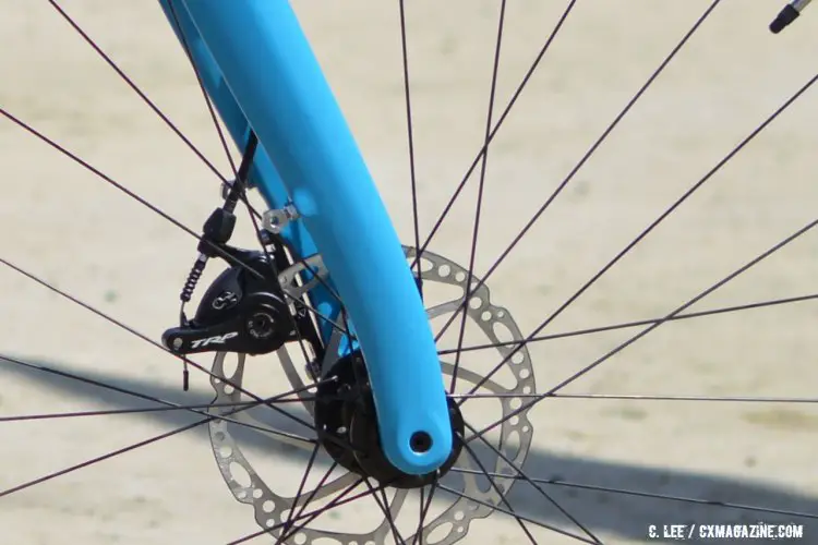 The elegent reverse curve of the Masi CXR fork as seen on one of the aluminum models. Note the fender mounts on the back of the fork legs. 2016 Sea Otter Classic. © Clifford Lee / Cyclocross Magazine