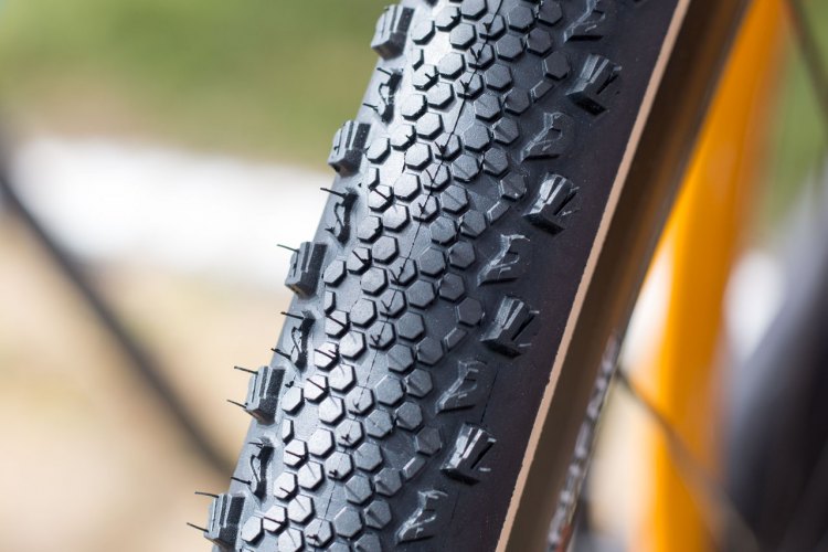 Vittoria's new directional XS tubular tire, with a fish scale-like pattern that's smooth in one direction and grippy in the opposite direction. Vittoria Tires and Wheels, Sea Otter Classic 2016. © Cyclocross Magazine