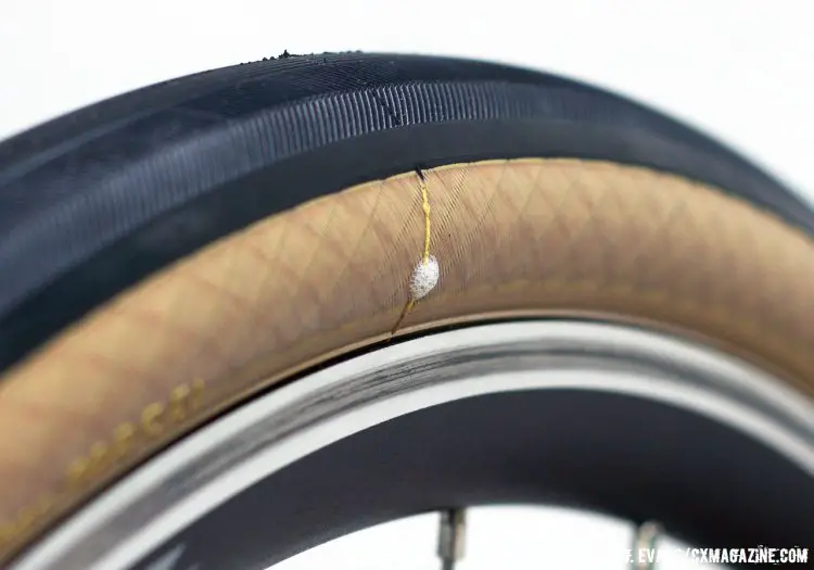 The tires were a struggle to set up tubeless with the HED Belgium Plus rims. One tire finally sealed after heave use of soapy water, while the second tire required the replacement of the thin Stans tape with some beefy Gorilla Tape before seating would occur. © Greg Evans / Cyclocross Magazine