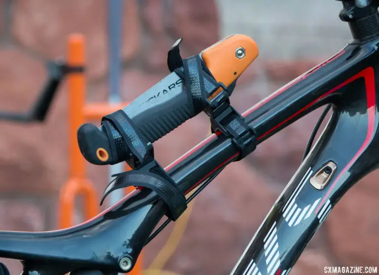 The Anywhere Adapter straps help you mount anything, anywhere, including this knife to your top tube. Ouch. Magura Press Camp. © Cyclocross Magazine