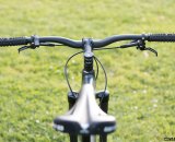 30mm rise, 720mm wide 3C riser bars give a mountain bike feel to the "urban moto" Coastline Cycle Co. The One SSRX 650b bike. © Cyclocross Magazine