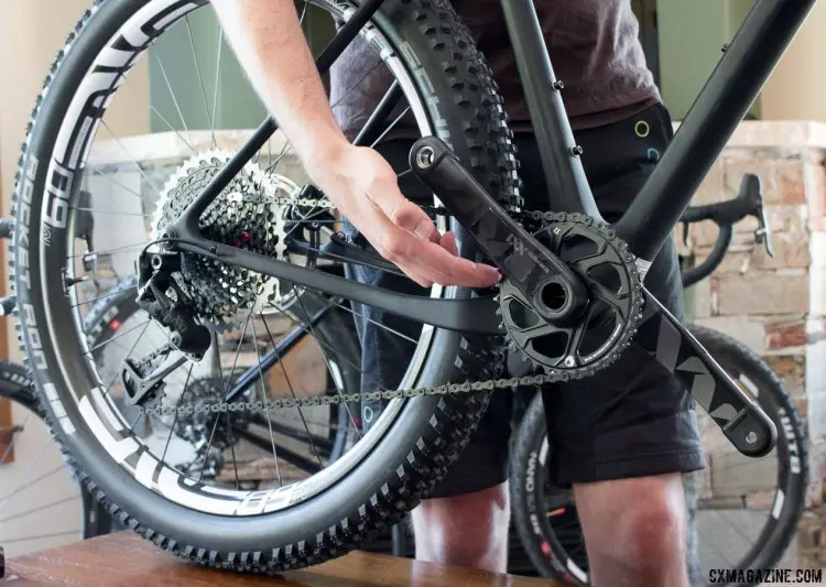Gerard Vroomen points out the dropped chainstay used on both the Open Cycle's ONE+ mountain bike hardtail, Open U.P. gravel bike, and the 3T Exploro bike. © Cyclocross Magazine