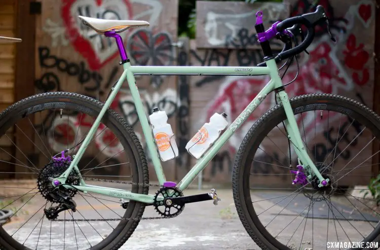 Our purple Paul-dressed Surly test bikes with Tall and Handsome post, Boxcar stems, Top Cap Light Mount, Klamper brakes, Chain Keeper, SRAM Shifter Mount, Cross Stop lever, Quick Releases and more. © Cyclocross Magazine