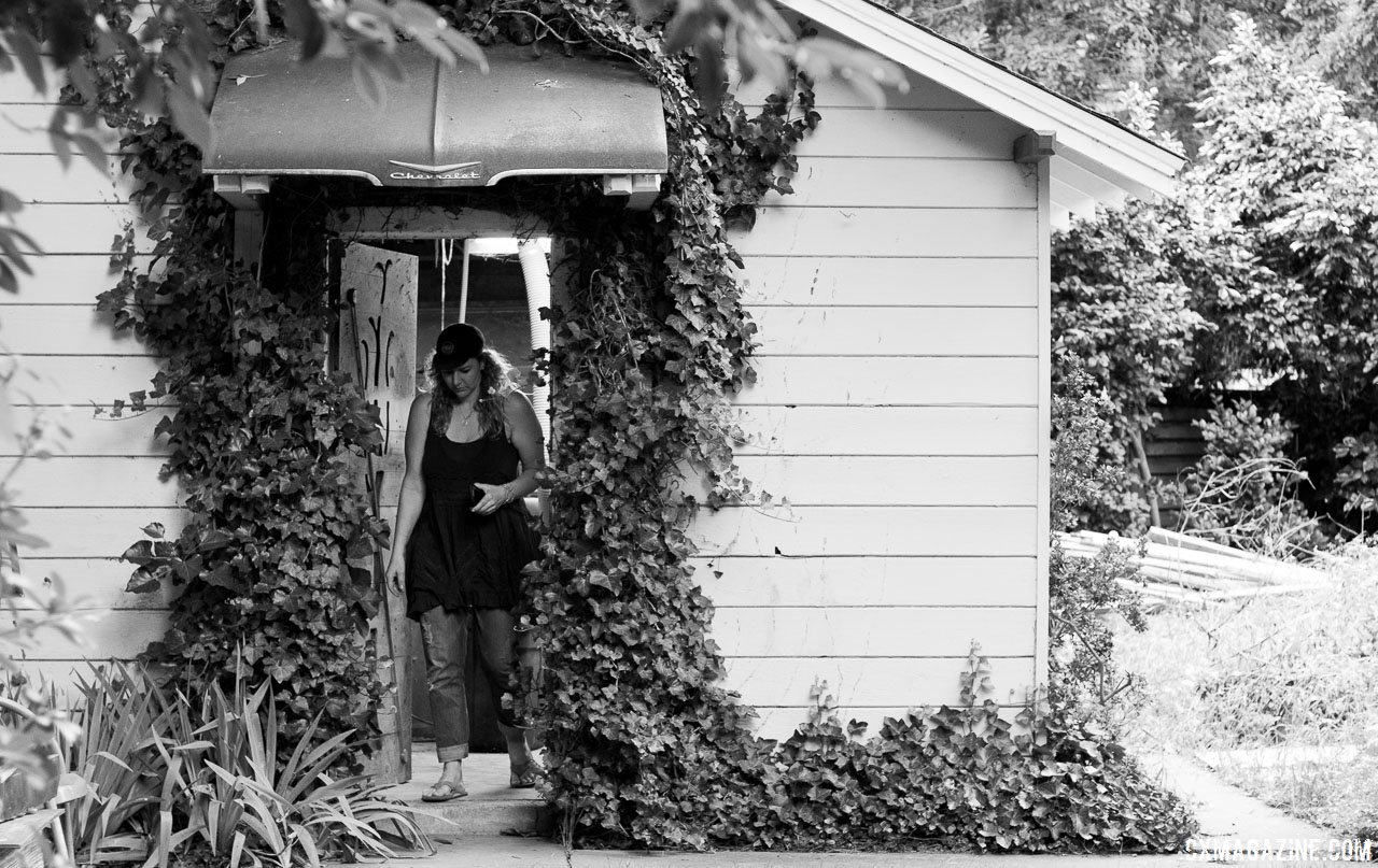 Paul Price's wife Marley emerges from his second shop the garage at