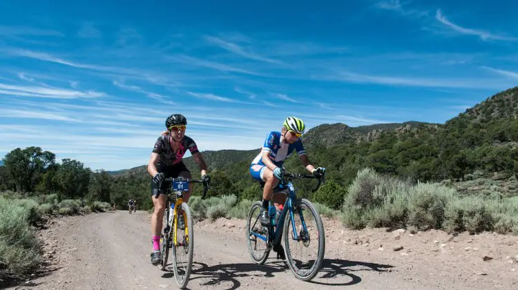 Mindy McCutcheon, left and Robin Farina, right rode side by side for most of the day neither yeilding until the slopes of Col D Crush where McCutheon soloed away for the win. Here the two racers are on Doc Springs Road (also known as the Sarlacc Pit). 2016 Tushar Crusher. Photo courtesy Christopher See